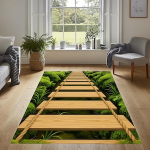 May include: A rectangular area rug featuring a wooden bridge design. The bridge is made of light brown planks with rope railings, set against a backdrop of lush green moss and foliage. The rug adds a natural, outdoorsy feel to the room.