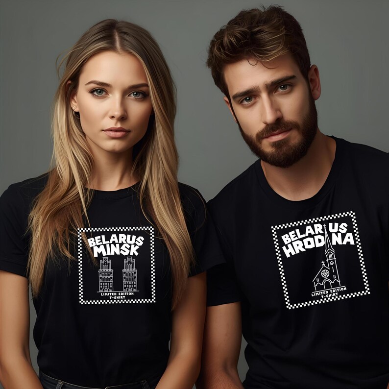 May include: Two people wearing black t-shirts. The woman's shirt has a white graphic of two buildings with the text "BELARUS MINSK" and "LIMITED EDITION". The man's shirt has a white graphic of a church with the text "BELARUS HRODNA" and "LIMITED EDITION".