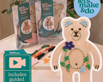 May include: A wooden bear embroidery kit with colourful threads, needles, and felt pieces. The kit includes a guided video tutorial. Let's Make & Do.