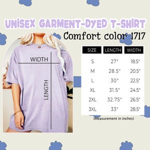 May include: A light purple unisex garment-dyed t-shirt. The image includes a size chart with measurements in inches: S (27" length, 18.5" width), M (28.5" length, 20.5" width), L (30" length, 22.5" width), XL (31.5" length, 24.5" width), 2XL (32.75" length, 26.5" width), and 3XL (33" length, 28.5" width).