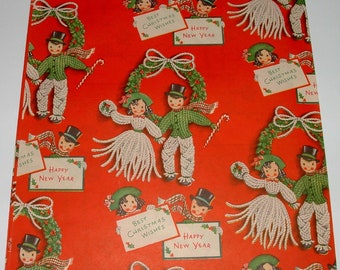 May include: Red wrapping paper with a repeating pattern of white yarn figures holding holly wreaths and signs with the text "Best Christmas Wishes" and "Happy New Year".