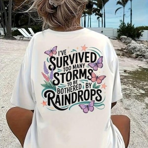 I&#39;ve Survived Too Many Storms To Be Bothered By Raindrops SVG, Motivational Quotes PNG Sublimation Design, Unisex Graphic SVG