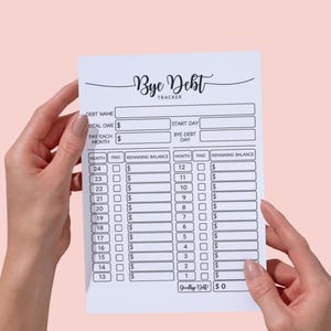 May include: A white "Bye Debt" tracker sheet with spaces for debt details, payment tracking, and remaining balances. The sheet includes the text "DIGITAL ONLY in PDF file".