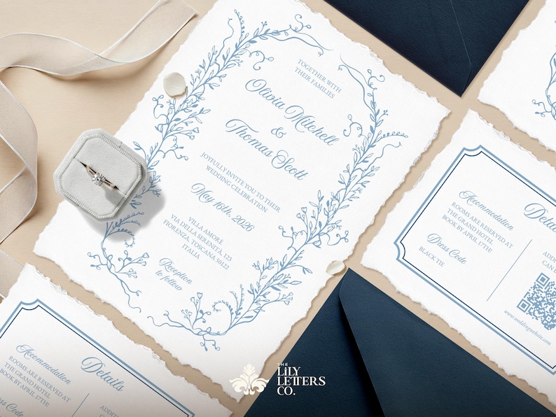 May include: Wedding invitation suite with a blue floral design. The invitation features the names Olivia Mitchell and Thomas Scott, the wedding date May 16th, 2026, and the location Villa Amore, Via della Serenita, 123, Firenze, Toscana, Italy. The RSVP details are included on the back of the invitation.