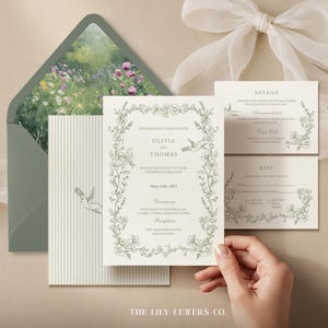 May include: A wedding invitation suite featuring a sage green envelope with a floral interior, a striped card, and white cards with botanical line art borders. The text includes names Olivia and Thomas, date May 15th, 2025, and event details.