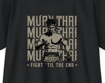 May include: Black t-shirt featuring a Muay Thai fighter graphic. The design includes the words "MUAY THAI" repeated vertically and the phrase "FIGHT 'TIL THE END". The fighter is depicted in a fighting stance.