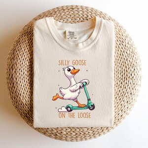 Funny Duck Cartoon Design,Silly On The Loose T-Shirt, Quirky Graphic Tee, Humorous Animal Apparel, Unique Gift for Animal Lovers