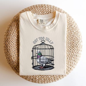 Funny Cartoon Bird Tee, Got Too Silly T Shirt, Pigeon Trapped in Cage Design,Unique Animal Lovers Gift,Quirky Graphic Tee,Bird Lover Apparel