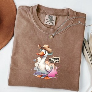 Silly On The Loose T-Shirt, Funny Duck Cartoon Design, Quirky Graphic Tee, Humorous Animal Apparel, Unique Gift for Animal Lovers
