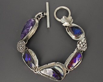 Four Blue Opals with Purple Charoite