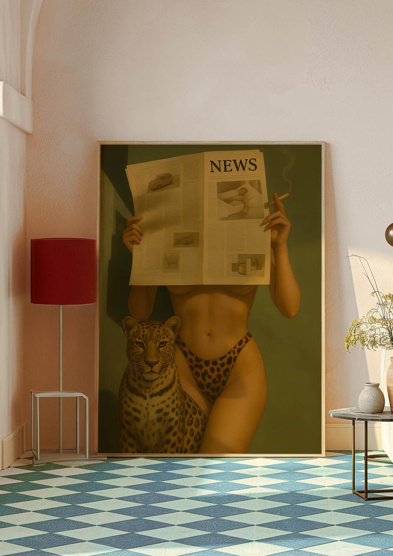 May include: A framed artwork featuring a woman in leopard print bikini bottoms holding a newspaper with the headline "NEWS". A leopard is beside her. The woman is smoking a cigarette. The background is a muted green.
