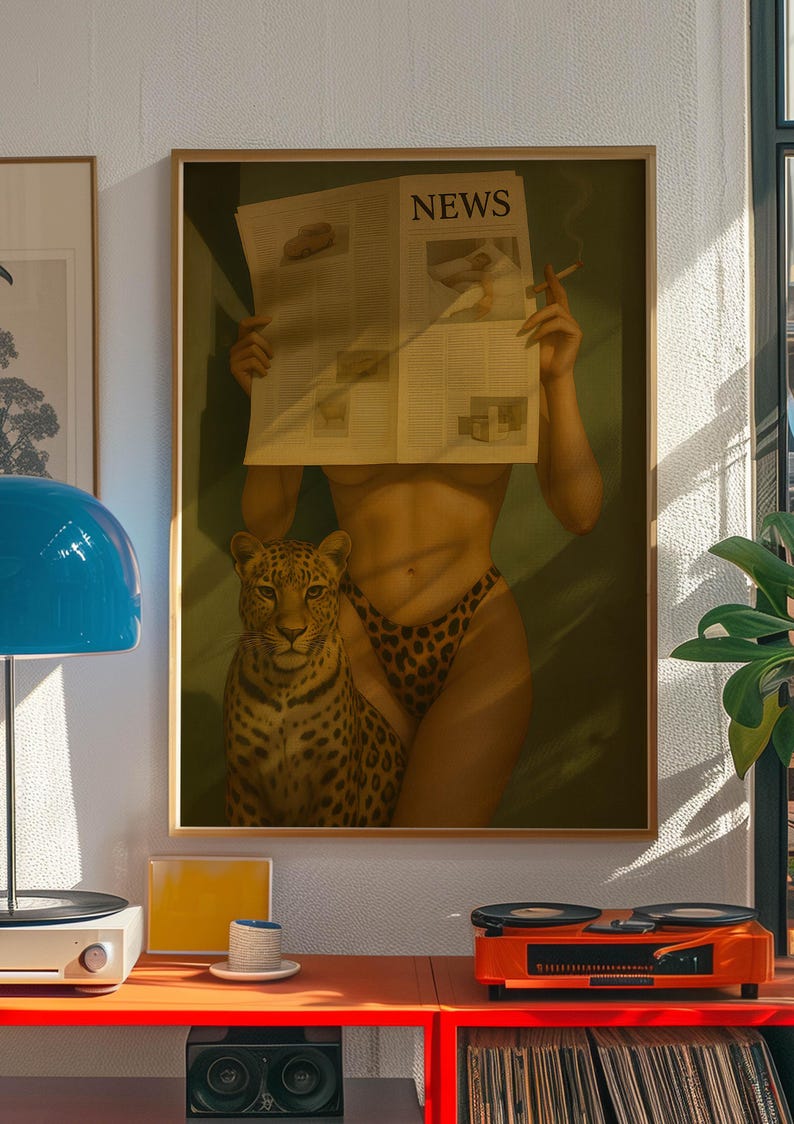 May include: A framed artwork featuring a woman holding a newspaper with the headline "NEWS", a leopard, and a cigarette. The woman wears leopard print underwear. The artwork is displayed above a red shelf with a record player.