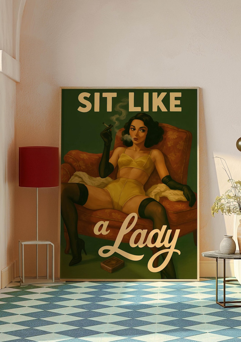 May include: A framed poster with the text "SIT LIKE a Lady" features a woman in yellow lingerie, black gloves, and stockings, smoking a cigarette while seated in a red armchair. The poster is displayed in a room with a red lamp and a blue and white checkered floor.