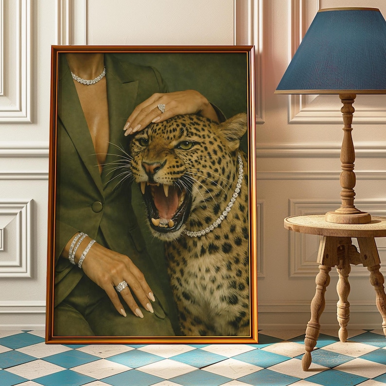 May include: A framed artwork featuring a roaring leopard adorned with a diamond necklace. A person in a green blazer and diamond jewelry is in the image. The artwork is in a gold frame, with a blue and white checkered floor.