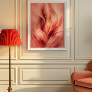 May include: An abstract painting in a white frame, with red, pink, and white tones, hangs on a wall. A red lampshade sits atop a gold lamp, and a peach-coloured armchair is in the corner. The floor has a blue and white chequered pattern.