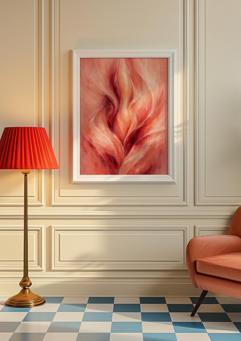 May include: An abstract painting in a white frame, with red, pink, and white tones, hangs on a wall. A red lampshade sits atop a gold lamp, and a peach-coloured armchair is in the corner. The floor has a blue and white chequered pattern.