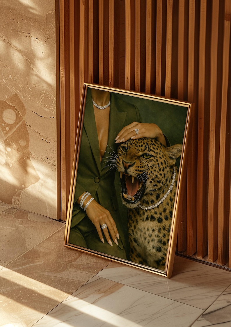 May include: Framed artwork featuring a woman in a green suit and a roaring leopard adorned with diamond jewelry. The artwork is set against a backdrop of a wooden wall and tiled floor, creating a luxurious aesthetic.