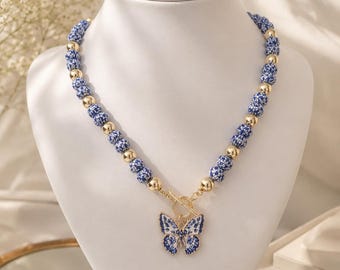 Oceanic Blue Butterfly Necklace | Blue & White Porcelain Beaded Necklace | Gold Accent Statement Necklace | Coastal Jewelry | Handmade Gift