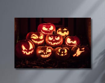 Jack o'-lantern pumpkin painting - photo of carved pumpkin on black background. Creepy.