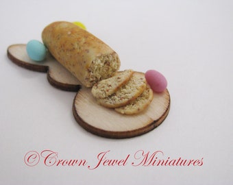 1:12 Easter Bread With Dyed Eggs on a Bunny Rabbit cutting board by IGMA Artisan Robin Brady-Boxwell - Crown Jewel Miniatures