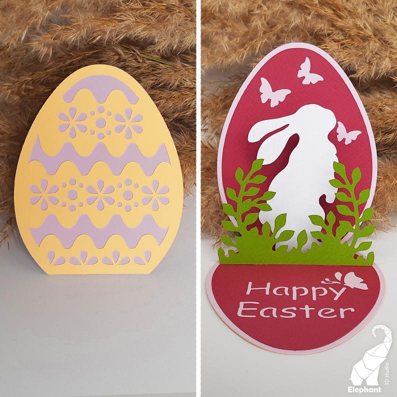 May include: Two Easter card designs. The first card is a yellow egg with a purple and white pattern. The second card is a red egg with a white bunny inside and green leaves. Both cards say "Happy Easter".