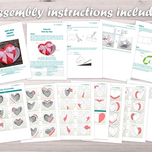 May include: A printable PDF tutorial for making a heart-shaped gift box. The tutorial includes step-by-step instructions and diagrams for assembling the box. The box is made of paper and is decorated with a pink ribbon.