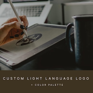 May include: A person is using a stylus to draw on a tablet. The tablet is on a desk with a laptop and a mug. The text at the bottom of the image reads "CUSTOM LIGHT LANGUAGE LOGO + COLOR PALETTE."