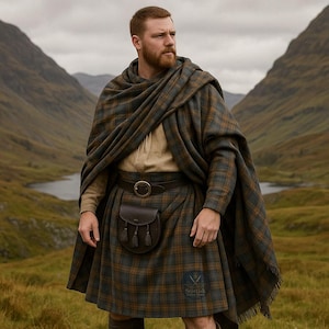 May include: A person wearing a traditional Scottish kilt outfit. The outfit includes a plaid kilt, matching shawl, leather belt, and sporran. The kilt is a mix of green, brown, and blue. The background features a scenic view of mountains and a lake.