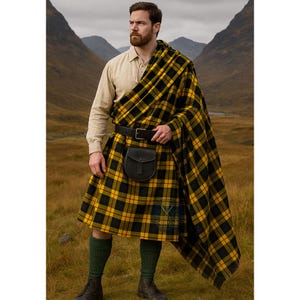 May include: A man wearing a traditional Scottish kilt outfit. The kilt is yellow and black plaid, paired with a matching shawl. A black leather belt and sporran complete the look. The background features a mountainous landscape.
