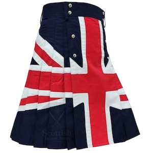 May include: A navy blue kilt featuring the Union Jack flag design in red, white, and navy blue. The kilt has pleats and silver button details. The bottom of the kilt has the text "Scottish Tailor Store".