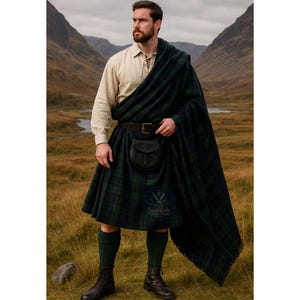 May include: A person wearing a traditional Scottish outfit, including a green and navy plaid kilt, matching shawl, and a leather sporran. The outfit also includes a cream-colored shirt, dark green socks, and black boots. The background features a mountainous landscape.