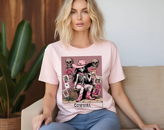 Pink Cowgirl T-shirt Designed as a Tarot card with a skeleton Cowgirl, pink boots, pink roses, pink hat and skulls Unisex Great gift for mom