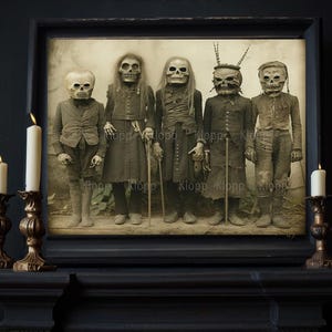 May include: A framed vintage photograph depicts five figures wearing skull masks and antique clothing. The image is set against a dark background, with lit candles in ornate holders on a mantelpiece below. A spooky, Halloween-themed artwork.