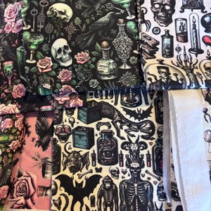 May include: A collection of patterned fabric featuring gothic and Halloween-themed designs. The patterns include skulls, ravens, roses, potion bottles, and skeletons in various colors. The fabric is suitable for crafting and sewing projects.