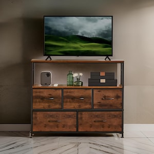 May include: A brown wooden cabinet with black metal accents and six drawers. The cabinet has a shelf on top and is decorated with a rustic wood finish. A television is sitting on the shelf.
