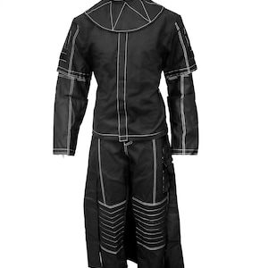 May include: A black jumpsuit with white stitching. The jumpsuit has a high collar and long sleeves. The pants have a wide leg and a long, flowing skirt.