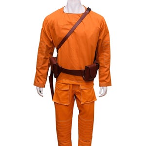 This listing features a high-quality, screen-accurate Star Wars Rebel Pilot/Prisoner Costume Replica, perfect for cosplayers, collectors, and fans. The outfit includes a bright orange flight suit with detailed stitching, padded knee panels, and large utility pockets for an authentic look. A brown leather belt with holsters and an adjustable cross-body strap completes the ensemble, making it a must-have for conventions, cosplay Mandalorian events, and Star Wars enthusiasts.  Halloween, Comic-Con.
