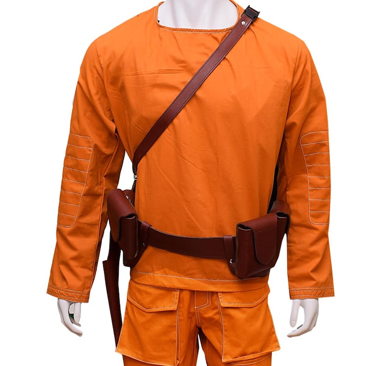 This listing features a high-quality, screen-accurate Star Wars Rebel Pilot/Prisoner Costume Replica, perfect for cosplayers, collectors, and fans. The outfit includes a bright orange flight suit with detailed stitching, padded knee panels, and large utility pockets for an authentic look. A brown leather belt with holsters and an adjustable cross-body strap completes the ensemble, making it a must-have for conventions, cosplay Mandalorian events, and Star Wars enthusiasts.  Halloween, Comic-Con.