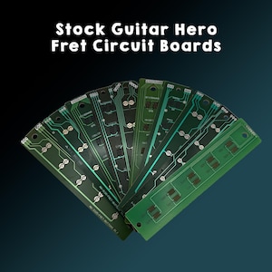 May include: A fan of green circuit boards with intricate white and copper-colored pathways. The boards are labeled "Stock Guitar Hero Fret Circuit Boards". The boards are designed for a guitar.