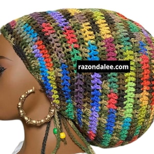 May include: A white ceramic mug with a black handle and the text "But First, Coffee" in a black, handwritten-style font. The mug is on a white surface.