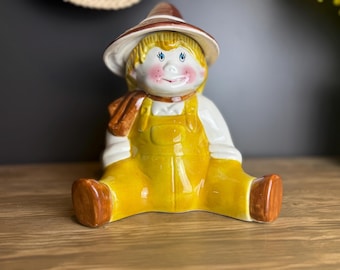Vintage Farm Boy Ceramic Figurine Yellow Overalls Cottagecore Farmhouse Shelf Decor