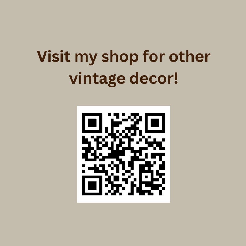 May include: A square black and white QR code centered on a light beige background. Above the QR code, dark brown text reads: Visit my shop for other vintage decor! The design is simple, featuring high contrast between the dark text and code against the neutral background.
