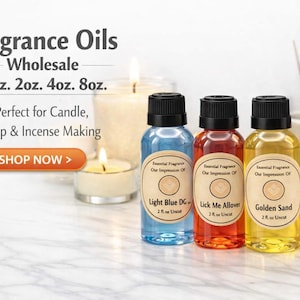 May include: Image of three fragrance oil bottles in blue, red, and yellow, with black caps. The bottles are labeled "Light Blue DG", "Lick Me Allover", and "Golden Sand". The image also includes text that says "Fragrance Oils Wholesale" and "Perfect for Candle, Soap & Incense Making".