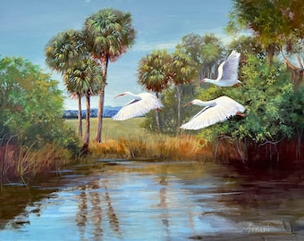 May include: A painting of three white birds flying over a pond with palm trees in the background.