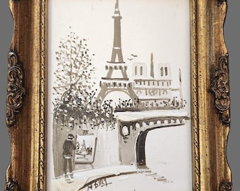 May include: A framed painting of the Eiffel Tower and Parisian architecture in shades of gray and white. The painting is in a gold ornate frame. A figure is painting the scene on an easel. The painting is signed "N. Billy".