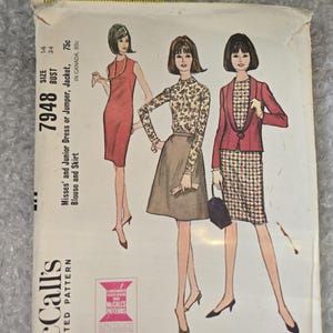 May include: Vintage McCall's sewing pattern for a dress or jumper, jacket, blouse and skirt. The pattern number is 7948, size 14, bust 34. The pattern is printed on white paper with illustrations of three women wearing the different garments.