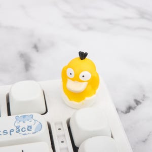 Manopola del volume della tastiera ispirata a Psyduck