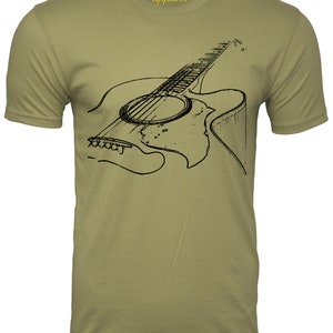 Graphic t-shirt with an acoustic guitar image on chest area short sleeve light olive man shirt with black image of a guitar musician man Tshirt