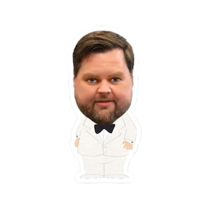 May include: A die-cut sticker featuring a cartoon-style illustration of a man in a white tuxedo with a black bow tie. The man has a round face, brown hair, a beard, and blue eyes. The sticker is on a white background.