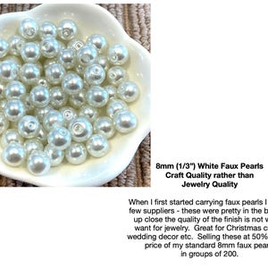 May include: A collection of 8mm (1/3") white faux pearls in a white bowl. The pearls are round and have a glossy finish. Text on the image reads "8mm (1/3") White Faux Pearls Craft Quality rather than Jewelry Quality."